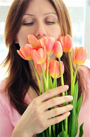 smelling tulip - Mature woman holding bouquet of flowers Stock Photo - Budget Royalty-Free & Subscription, Code: 400-04573233