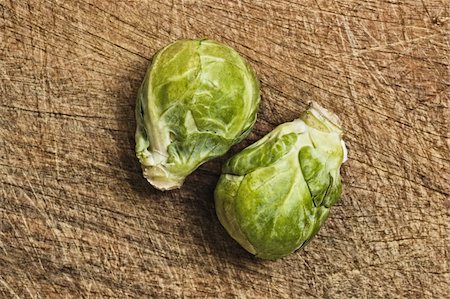 simsearch:400-06429494,k - Brussels sprouts, close up, on wooden table,  studio shot. Stock Photo - Budget Royalty-Free & Subscription, Code: 400-04573267