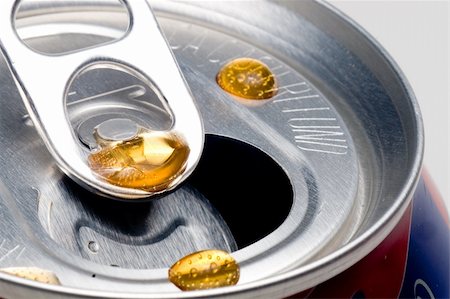 A Cola Drip on the top of a soft drink can. Stock Photo - Budget Royalty-Free & Subscription, Code: 400-04573269
