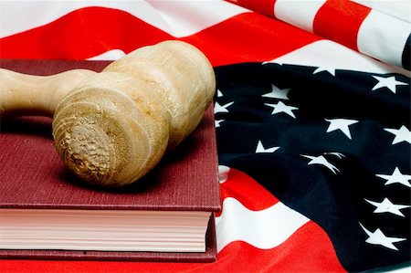 An open law book and a judges gavel on an American flag. Stock Photo - Budget Royalty-Free & Subscription, Code: 400-04573270