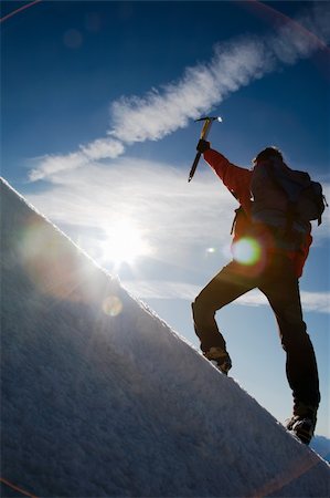 simsearch:862-05997490,k - Lone male mountain climber climbing a snowy ridge; Mont Blanc, Europe. Photographie de stock - Aubaine LD & Abonnement, Code: 400-04573364