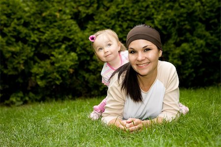 simsearch:400-08787277,k - happy family relaxing on grass Stock Photo - Budget Royalty-Free & Subscription, Code: 400-04573420