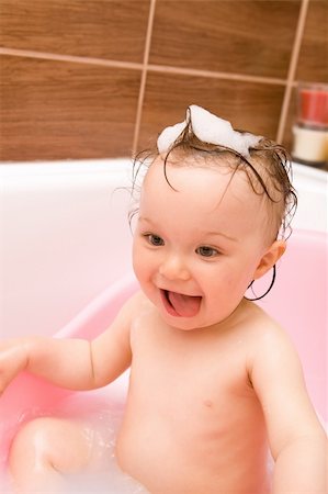 sweet and happy baby girl in bathroom Stock Photo - Budget Royalty-Free & Subscription, Code: 400-04573435