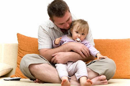 father and baby girl playing on sofa Photographie de stock - Aubaine LD & Abonnement, Code: 400-04573447