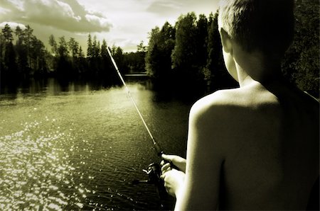 Boy Fishing a summer day Stock Photo - Budget Royalty-Free & Subscription, Code: 400-04573568