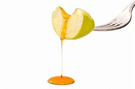 simsearch:400-09080023,k - Honey drippin from a green apple slice isolated on white Foto de stock - Royalty-Free Super Valor e Assinatura, Número: 400-04573588