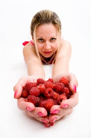 raspberry fingers - Long hair blonde woman in red with whole palms of raspberries Stock Photo - Budget Royalty-Free & Subscription, Code: 400-04573690