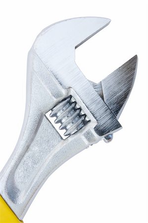 simsearch:400-05695467,k - Macro view of adjustable spanner wrench isolated over white background Fotografie stock - Microstock e Abbonamento, Codice: 400-04584478