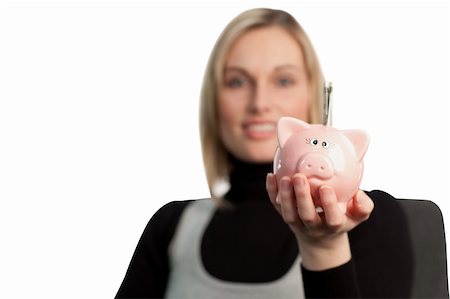 Pretty  Business woman holding a piggy bank Stock Photo - Budget Royalty-Free & Subscription, Code: 400-04584699