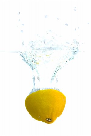 simsearch:630-02220372,k - Splashing yellow lemon Foto de stock - Super Valor sin royalties y Suscripción, Código: 400-04584788