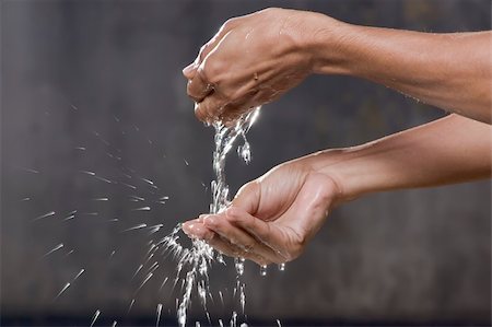 finger lakes - Hands catching clean falling water close up Stock Photo - Budget Royalty-Free & Subscription, Code: 400-04584882