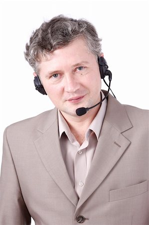 Handsome man with headset. Customer service. Call center operator.  Hotline operator with headset.  Helpdesk or support operator. Foto de stock - Super Valor sin royalties y Suscripción, Código: 400-04586674