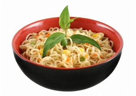 simsearch:400-04613511,k - Delicious Singapore noodle soup with Vietnamese mint. Fotografie stock - Microstock e Abbonamento, Codice: 400-04587292