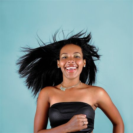 smiling young latina models - Portrait of young trendy african american girl with happy expresion Foto de stock - Super Valor sin royalties y Suscripción, Código: 400-04587425