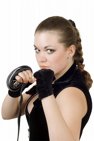 Pretty angry young woman throwing a punch. Isolated Stock Photo - Budget Royalty-Free & Subscription, Code: 400-04587775