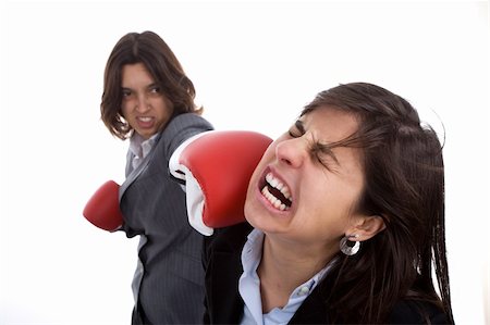 two businesswomen with boxing gloves fighting. isolated on white background. Photographie de stock - Aubaine LD & Abonnement, Code: 400-04588636