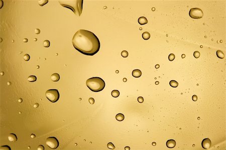 simsearch:400-05282643,k - Water droplets on golden surface Foto de stock - Super Valor sin royalties y Suscripción, Código: 400-04588702