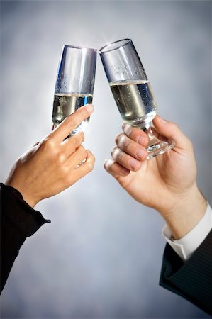cropped view of heterosexual couple toasting. Copy space Stock Photo - Budget Royalty-Free & Subscription, Code: 400-04588747