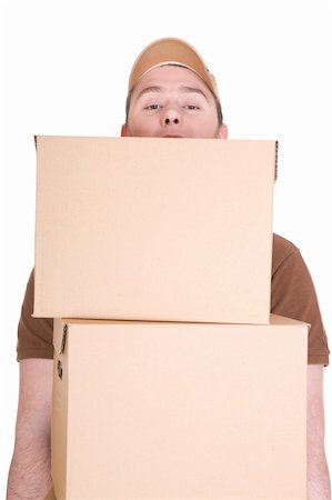 simsearch:700-01716484,k - delivery man with a package isolated on white background Foto de stock - Royalty-Free Super Valor e Assinatura, Número: 400-04588799