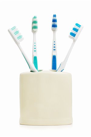 Tooth brush holder against a white background. Fotografie stock - Microstock e Abbonamento, Codice: 400-04589014