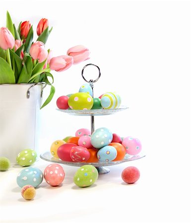 painted happy flowers - Colorful easter eggs with pink tulips on white background Stock Photo - Budget Royalty-Free & Subscription, Code: 400-04589429