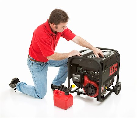 simsearch:400-03972302,k - Man preparing to put gasoline in his 10 horsepower electrical generator.  Isolated on white. Stock Photo - Budget Royalty-Free & Subscription, Code: 400-04580682