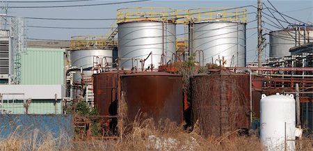 rusting tank - rusty pipes and huge barrels of old heavy industrial factory facilities Stock Photo - Budget Royalty-Free & Subscription, Code: 400-04580826