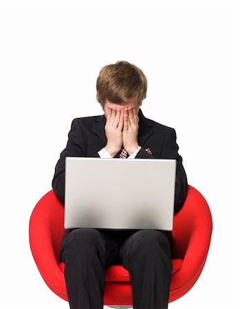 sorry boy pictures - A depressed man with a laptop Stock Photo - Budget Royalty-Free & Subscription, Code: 400-04581034