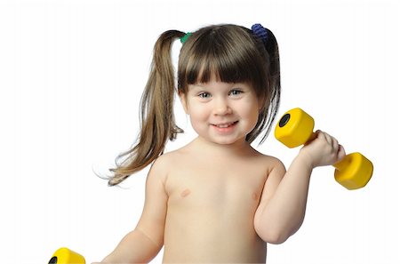 The little girl with dumbbells. It is isolated on a white background Stock Photo - Budget Royalty-Free & Subscription, Code: 400-04581747