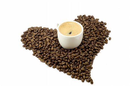 simsearch:400-03969594,k - Cup of coffee and heart of coffee beans on white background Photographie de stock - Aubaine LD & Abonnement, Code: 400-04581898