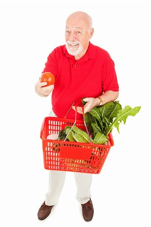 food market old people - Full body isolated view of a senior man grocery shopping and holding out a fresh tomato. Stock Photo - Budget Royalty-Free & Subscription, Code: 400-04582464