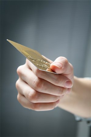 simsearch:695-03386967,k - Hand holding credit card. Stock Photo - Budget Royalty-Free & Subscription, Code: 400-04582919