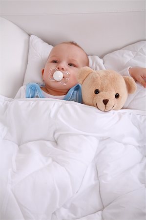 simsearch:400-04161658,k - Portrait of cute cute little babyl with teddy Fotografie stock - Microstock e Abbonamento, Codice: 400-04583197