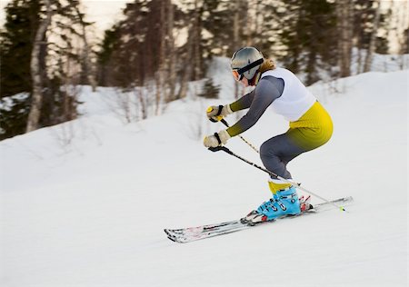 simsearch:400-05359143,k - The woman rushing on skis on a mountain slope Photographie de stock - Aubaine LD & Abonnement, Code: 400-04594212