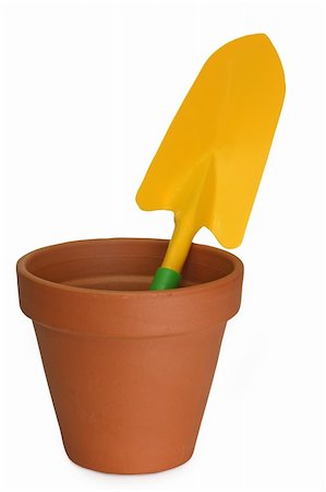 simsearch:400-08252596,k - Flower pot with garden shovel isolated on white background Photographie de stock - Aubaine LD & Abonnement, Code: 400-04594362