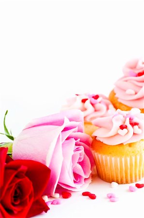 paper cups decorated - Valentines day roses and cupcakes with pink icing Stock Photo - Budget Royalty-Free & Subscription, Code: 400-04594890