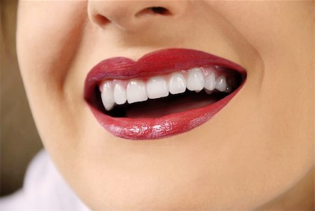 simsearch:400-04520503,k - woman with white teeth and red lips laughing Stock Photo - Budget Royalty-Free & Subscription, Code: 400-04595153