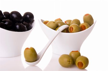 simsearch:400-07219392,k - Black and green olives isolated on  a white background Stock Photo - Budget Royalty-Free & Subscription, Code: 400-04595481