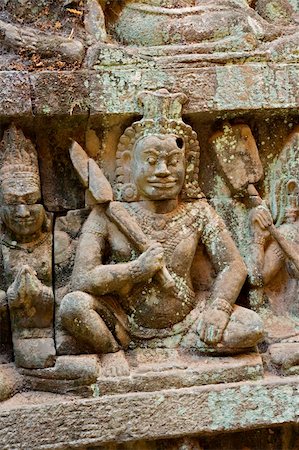 simsearch:400-05014452,k - The Terrace of the Leper King is located in the northwest corner of the Royal Square of Angkor Thom, which is part of the Ankgor Wat complex in northern Cambodia Foto de stock - Super Valor sin royalties y Suscripción, Código: 400-04595715