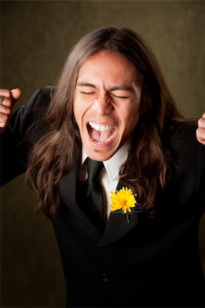 simsearch:400-04172755,k - Handsome man screaming in formal jacket with boutonniere Stock Photo - Budget Royalty-Free & Subscription, Code: 400-04596345