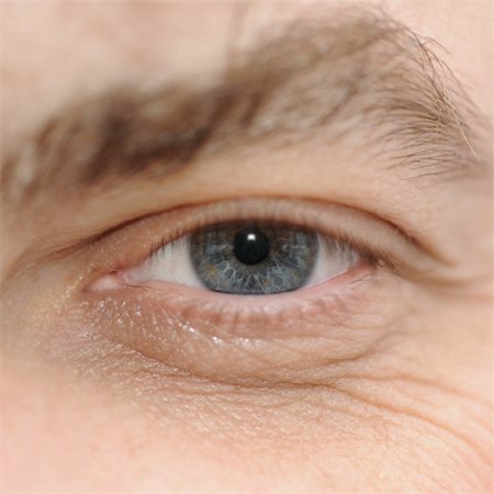 simsearch:400-08286222,k - Eye of the man. High detailed elaboration of an iris of the eye of a human eye Foto de stock - Royalty-Free Super Valor e Assinatura, Número: 400-04596458
