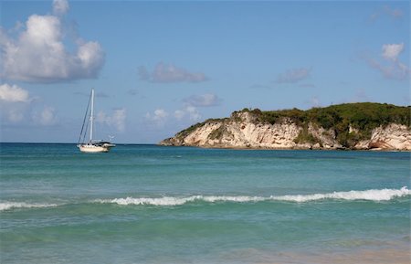 punta cana - A sailboat docked at a tropical beach, near Punta Cana Dominican Republic. Stock Photo - Budget Royalty-Free & Subscription, Code: 400-04596682