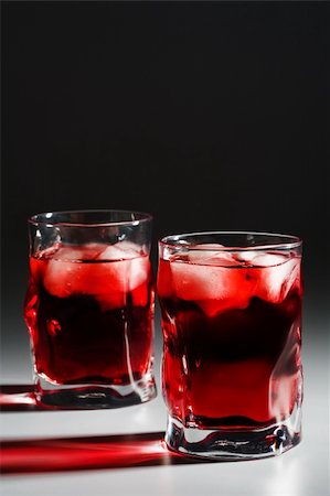 simsearch:400-03979160,k - Two beautiful glasses with a cocktail and an ice Stock Photo - Budget Royalty-Free & Subscription, Code: 400-04597288