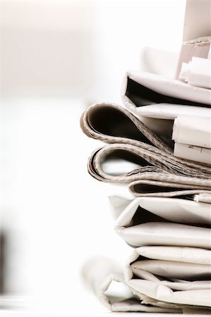 sunday market - pile of newspapers on the table Stock Photo - Budget Royalty-Free & Subscription, Code: 400-04597426