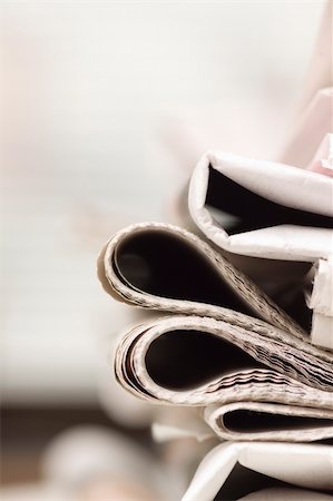 sunday market - pile of newspapers on the table Stock Photo - Budget Royalty-Free & Subscription, Code: 400-04597427