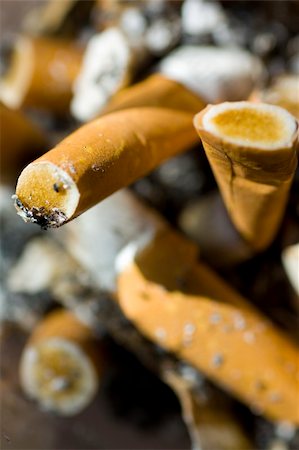 simsearch:600-01374353,k - Ashtray full of cigarette butts Stock Photo - Budget Royalty-Free & Subscription, Code: 400-04597420