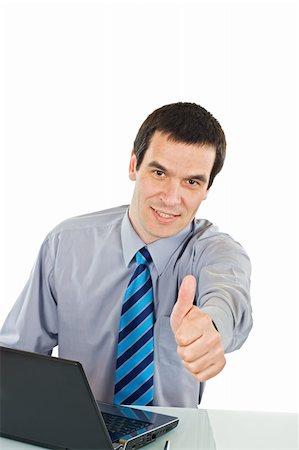 Businessman with laptop show thumb up sign - isolated Stock Photo - Budget Royalty-Free & Subscription, Code: 400-04597729