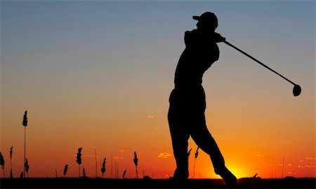 a silhouette of a golfer on a bright sky Foto de stock - Super Valor sin royalties y Suscripción, Código: 400-04597736