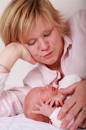 simsearch:400-04161658,k - Family moments - Mother enjoying her cute baby Fotografie stock - Microstock e Abbonamento, Codice: 400-04598521