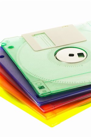 floppy disk - coulorfull plastic floppy disk on white background Fotografie stock - Microstock e Abbonamento, Codice: 400-04598587